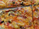 Pizza jambon, champignons § cheddar