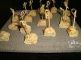 Mini-crêpes roulées au fromage frais et à la tapenade