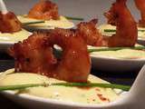 Cuillères de crevettes caramélisées sur une crème au curry