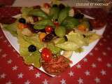 Salade à la viande de grison, tomates, pommes et noisettes