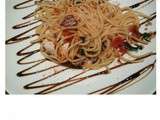 Spaghettoni aux calamars, persil et tomates confites
