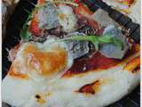Pizza à l’artichaut violet, prosciutto et roquette