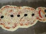 Pizza en forme de bonhomme de neige