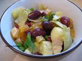 Salade grenade, clémentines, coeurs d'artichauts, poivrons, olives