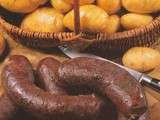 Boudin noir landais poêlé a sec, pomme rouge et ventrèche roulée aux épices basques, sauce au porto et cannelle de Chine