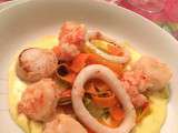 Saint-Jacques, crevettes et calamar grillés, sauce au parmesan et fondue de légumes