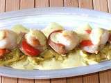 Noix de Saint Jacques sur lit de raviolis aux crevettes à la crème de curry