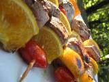 Brochettes de filet de canard, oranges et tomates cerises
