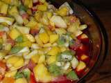 Astuce pour utiliser des framboises congelées : Salade de fruits frais au coulis de framboises
