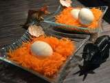 Oeufs marbrés sur nid de carottes