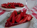 Tarte aux fraises sur lit de framboises