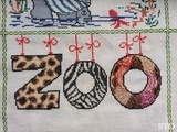 A l’entrée du Zoo, après le z o…. le dernier o