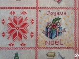 Case b, pour le Plaid en Fêtes Cadeau bleu Joyeux Noël aux cœurs de neige