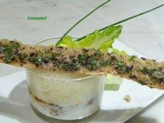 Oeuf cocotte au foie gras poele, ecume de sucrine & mouillette geante au beurre de truffe