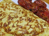 Omelette baveuse garnie de ricotta et courgettes poêlees au beurre et a l'aïl