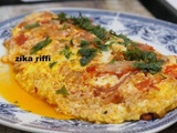 Omelette espagnole aux tomates-oignons-jambon - recette de grimoire