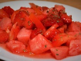 Salad with watermelon, strawberries and tomatoes