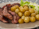 Canard aux raisins et confit d’oignons