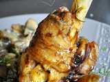 Souris d'agneau au jus confit de romarin et d'estragon, champignons de Paris