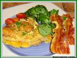 Omelette au lard, salade de mache, tomates cerises et fine tranches de lard grillees