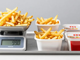 Poids d’une barquette de frites : ce que les fast-foods ne vous disent pas sur les grammages réels