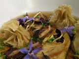 Foie gras poêlé,consommé de ramier à la blanche canaille et raviolis d'oignons jaunes au miso