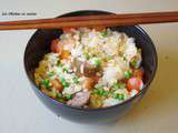 Chinoise : riz sauté à la tomate aux petits pois et à la saucisse fumé