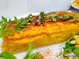 Flan de légumes au curcuma avec du fromage raclette et des fleurs de pissenlits