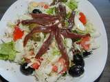 Salade aux riz-olives-oeufs-tomates-anchois