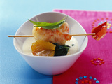 Langoustines en tempura d’amandes sur soupe de polenta
