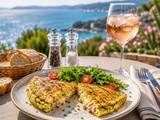 Omelette aux courgettes râpées, jambon et fromage