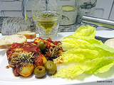 Quenelles en sauce tomate - olives vertes